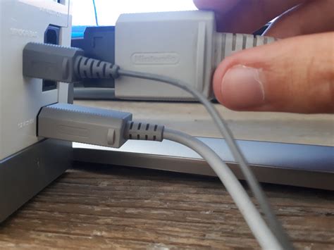 Een visuele vergelijking van de verschillende kabelopties voor het aansluiten van een Wii op een TV.