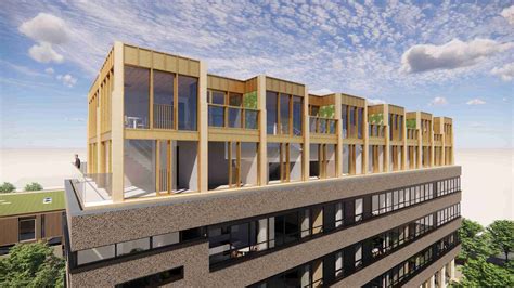 Visualisatie van een bestaand gebouw met een extra woonlaag erbovenop (optopwoning).