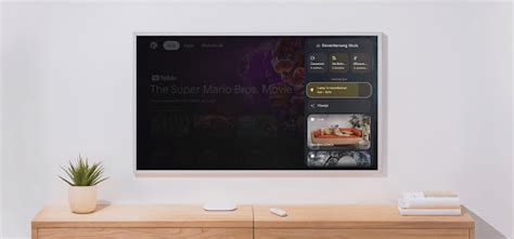 Illustratie van het Home-deelvenster op Google TV met voorbeelden van smarthome-apparaten.