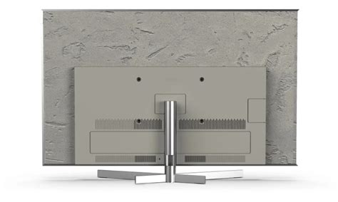 Illustratie van de achterkant van de Kenwood DVR-6100 met de verschillende aansluitingen gemarkeerd