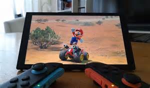 Een afbeelding die de verbinding van een Nintendo Switch via de dock naar een TV toont.