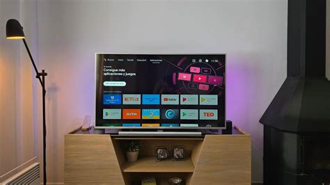 Screenshot van een smart tv menu met opties voor app-beheer en reset