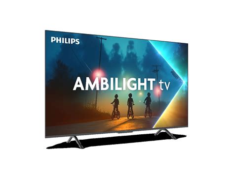 Een afbeelding van een Philips Ambilight Smart TV die aanstaat, met de Ambilight-verlichting die op de muur weerkaatst.