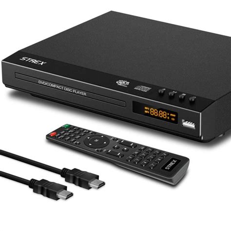 Een Harman Kardon DVD speler met afstandsbediening en aansluitkabels.