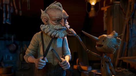 Een scène uit Guillermo del Toro's Pinocchio met Pinokkio en Gepetto
