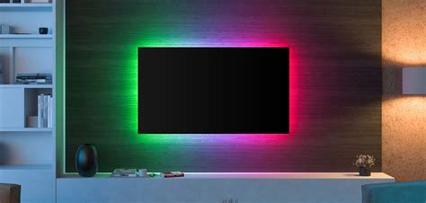 Illustratie van de Ambilight-technologie die licht uitstraalt vanaf de randen van de tv naar de muur.