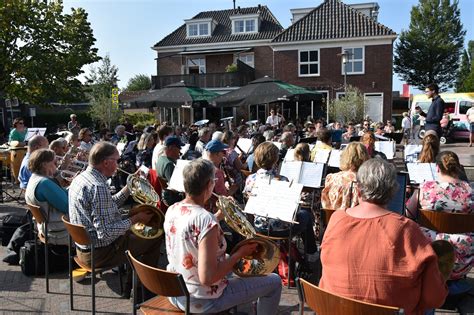 Infographic met de deelnemende orkesten en hun divisies op het WMC