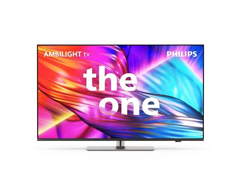 Een foto van de Philips 65PUS9010/12 tv, waarbij de Ambilight functie de muur achter de tv verlicht met sfeervolle kleuren.