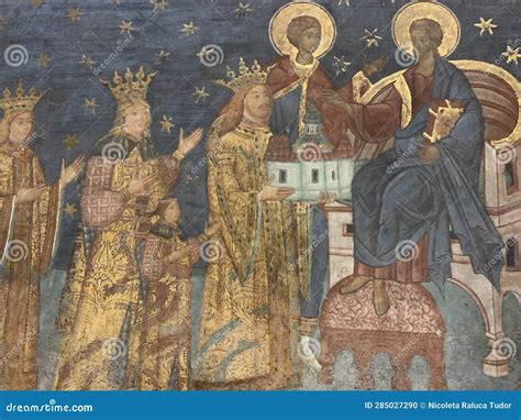 een reproductie van een middeleeuws schilderij met vrouwenfiguren